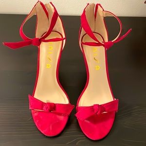 Size 6.5 hot pink high heels, suede material.
